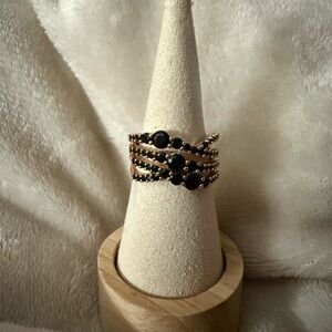 Elegant Gold and Black Women's Ring